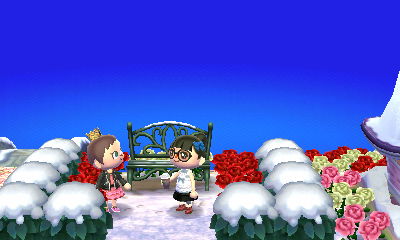 Screenshots from Boidoh on the bell tree screenshot from the game ACNL picturing two mayors and a bench with snow on it with red, white, and pink roses